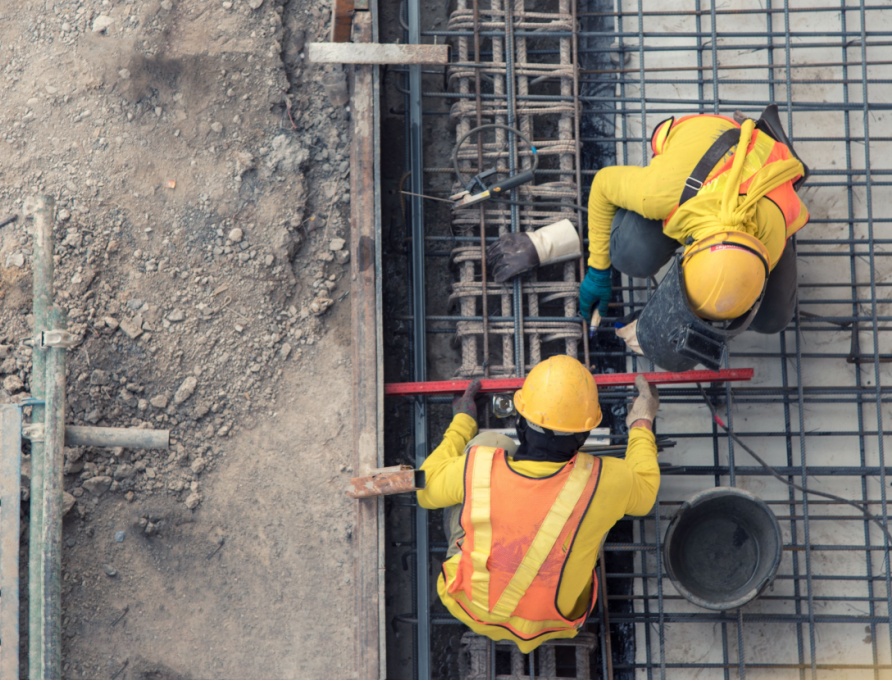 An aerial view of construction workers.