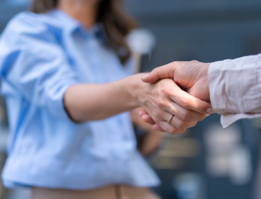 Two people shaking hands
