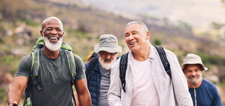 A group of men hiking together.