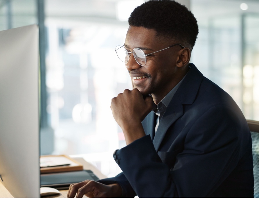 A man working at a computer.